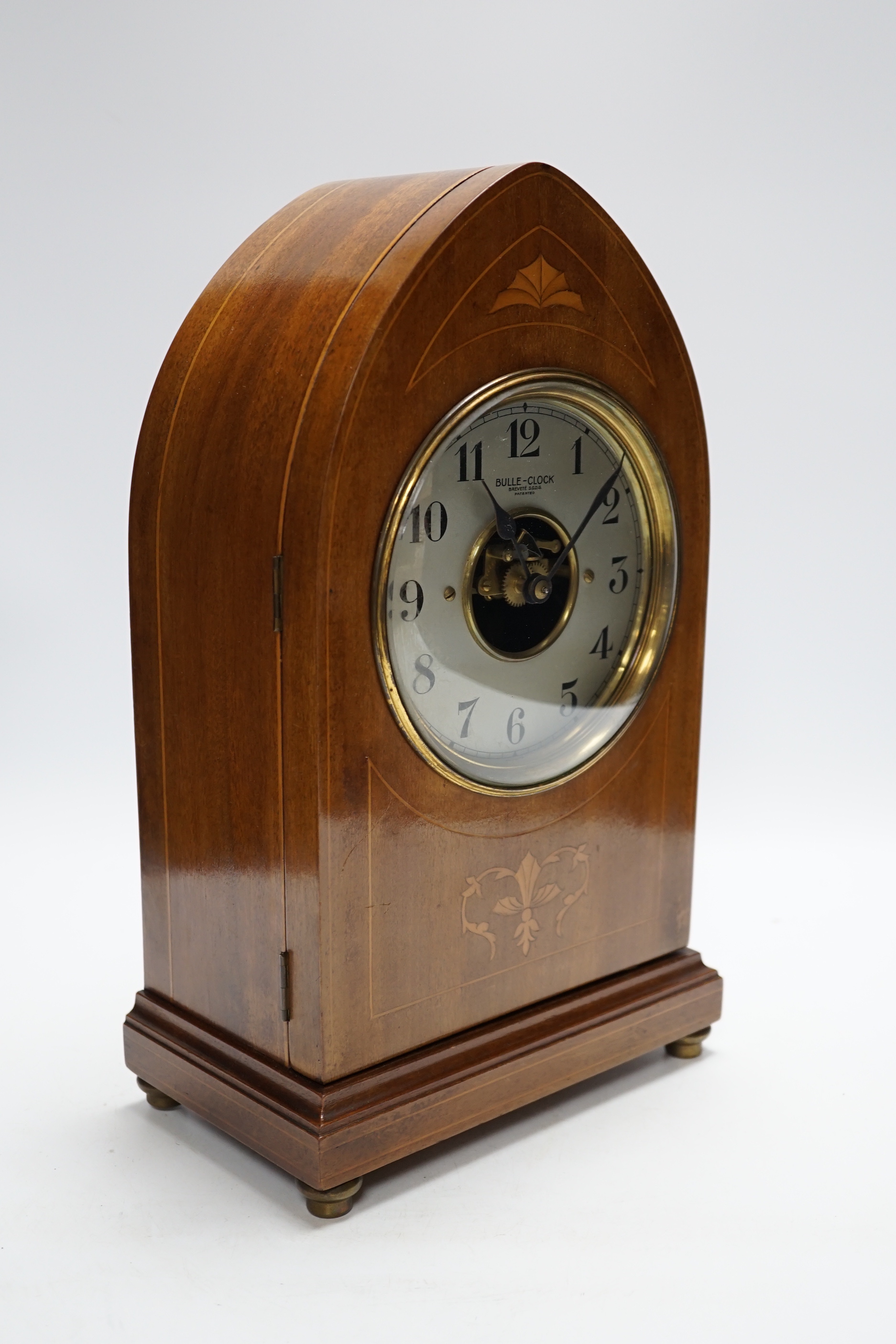 An early 20th century electro magnetic Boulle clock with inlaid case, height 36.5cm
